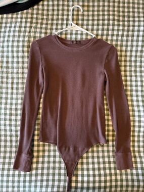 nuuds Ribbed Long Sleeve Bodysuit in Brown